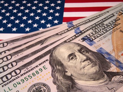 bigstock Us Dollars On Background Of Us 258193594 us economy
