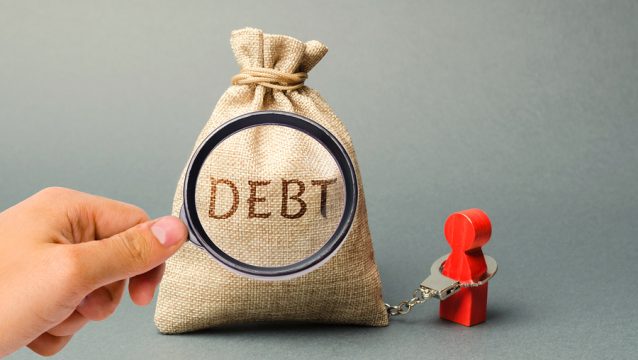 bigstock A Magnifying Glass Is Looking 295644895 debt chained handcuff recession